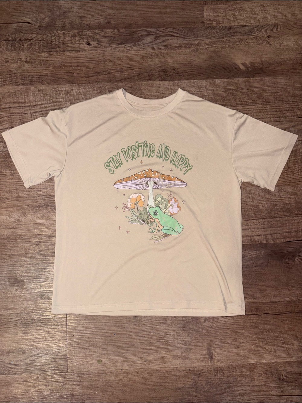 SHEIN cream graphic tee with green frog under a mushroom